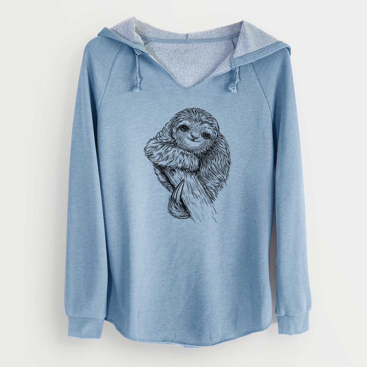 Misty blue women's Cali Wave hooded sweatshirt laid flat, printed with a detailed black ink illustration of a smiling pygmy three-toed sloth hanging from a branch.