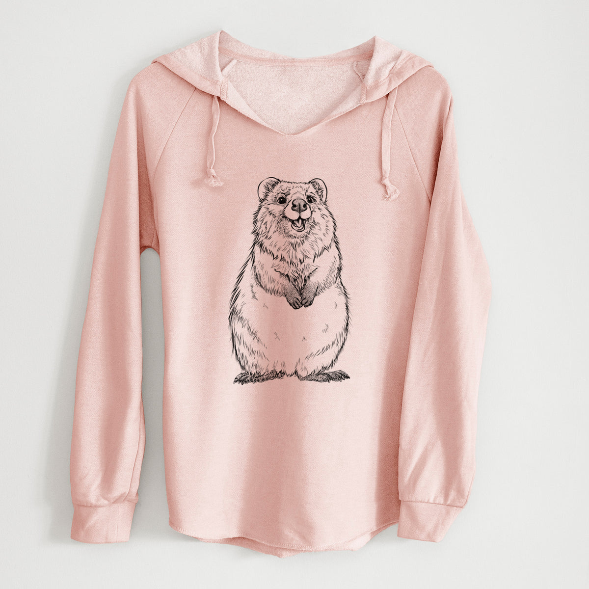 Blush pink women's Cali Wave hooded sweatshirt laid flat, printed with a black ink illustration of a smiling quokka sitting upright.