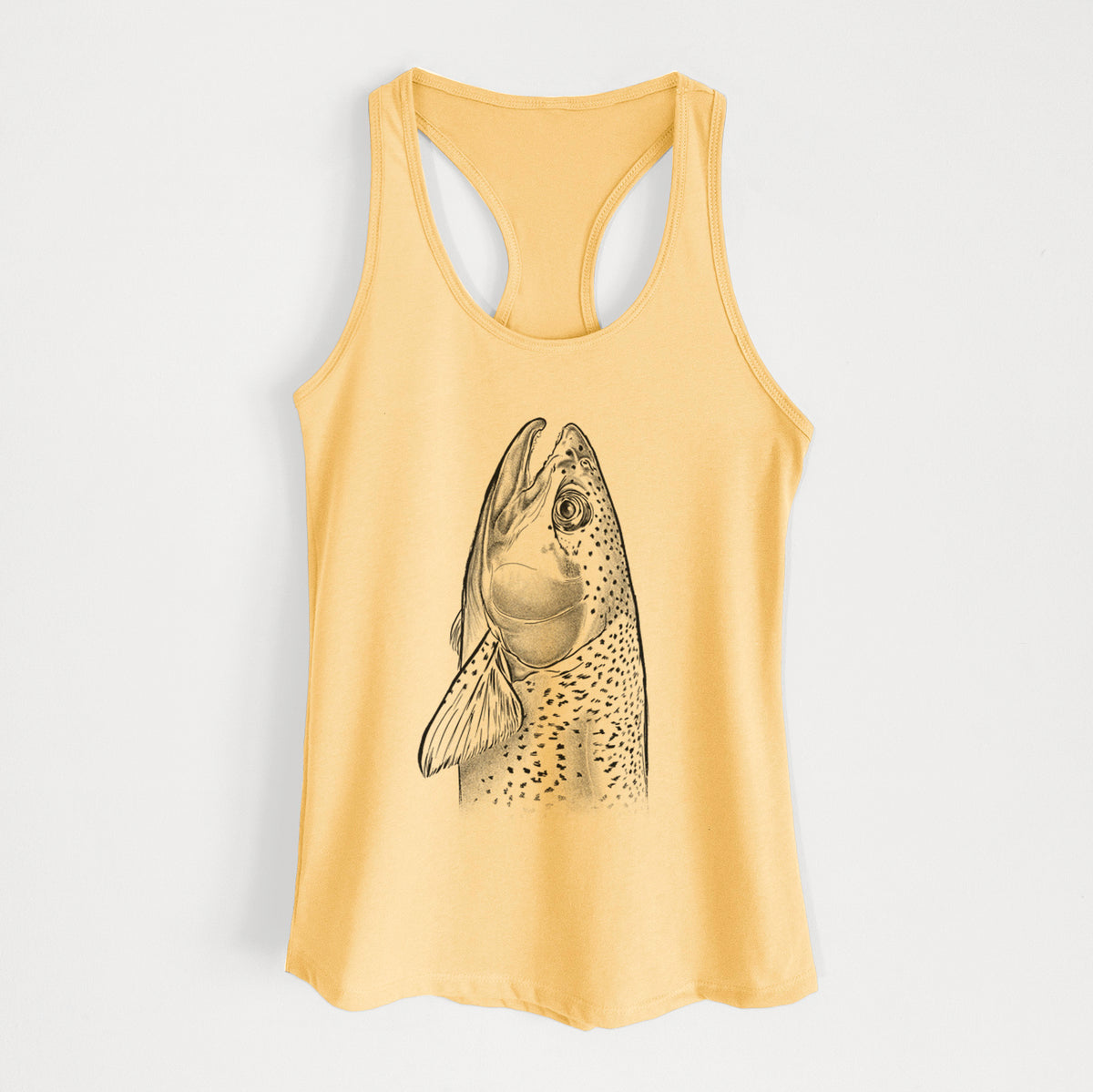 Banana cream women's racerback tank top laid flat, printed with a detailed black ink illustration of a rainbow trout's head pointing upward, showing its spotted scales.