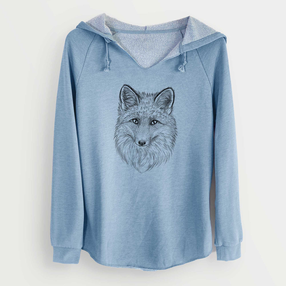 Misty blue women's Cali Wave hooded sweatshirt laid flat, printed with a detailed black ink sketch of a red fox's face looking straight ahead, its fur drawn in fine pencil-like strokes.