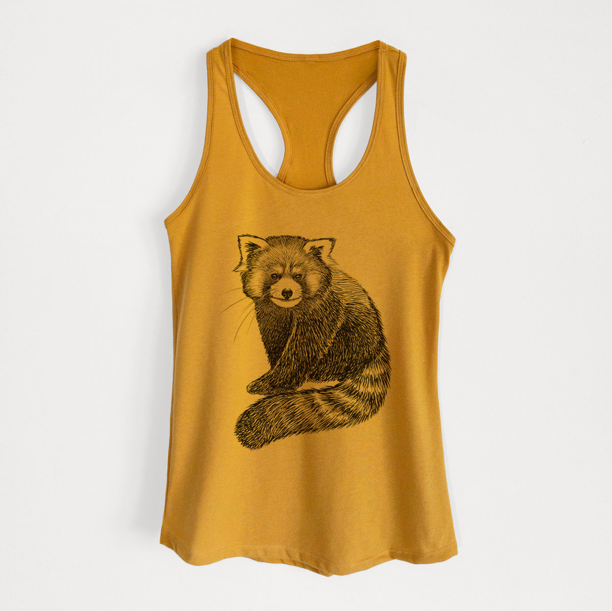 Gold women's racerback tank top laid flat, printed with a detailed black ink illustration of a red panda sitting with its striped tail wrapped around.