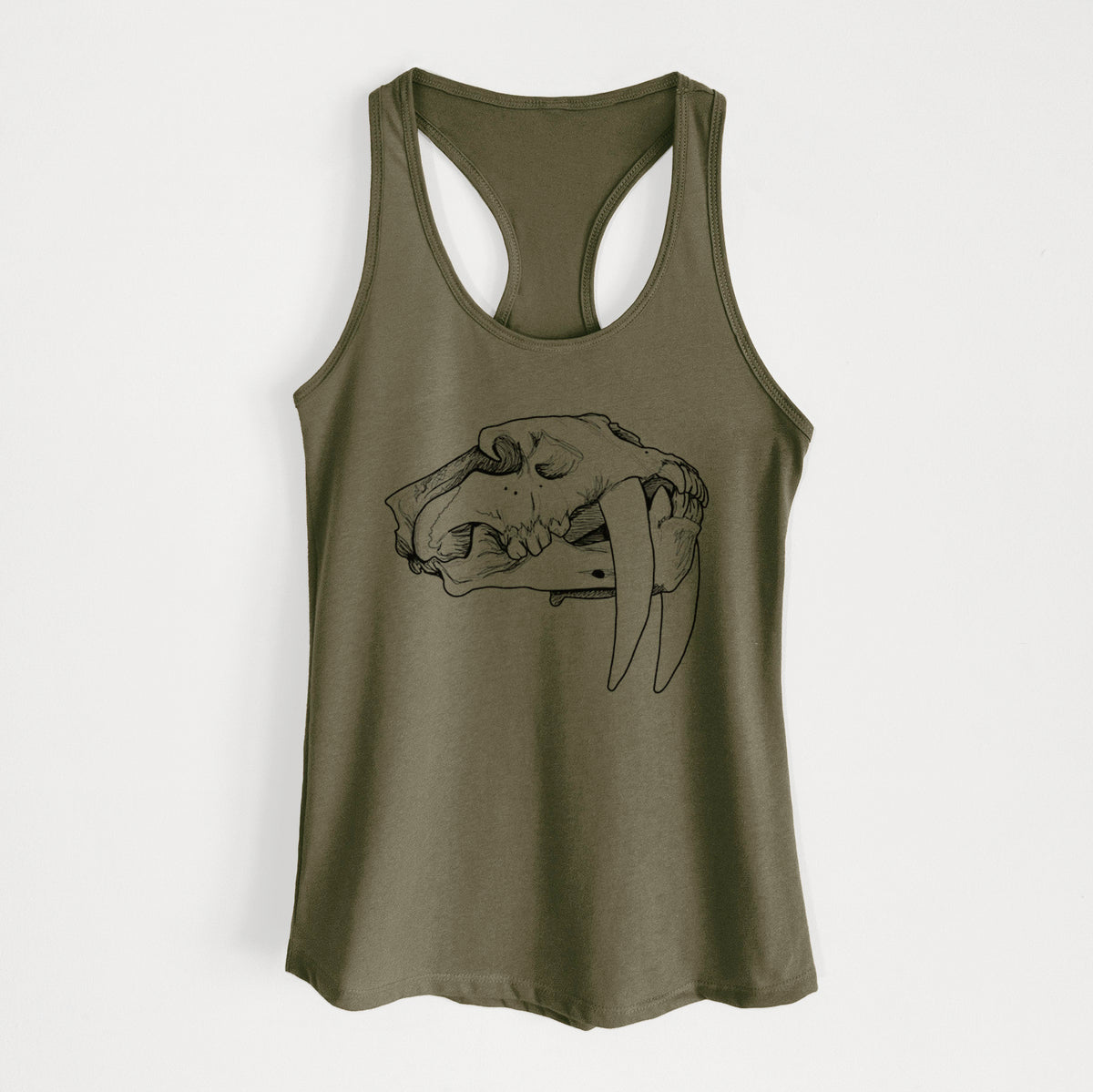 Military green women's racerback tank top laid flat, printed with a detailed black ink illustration of a saber-toothed tiger skull.
