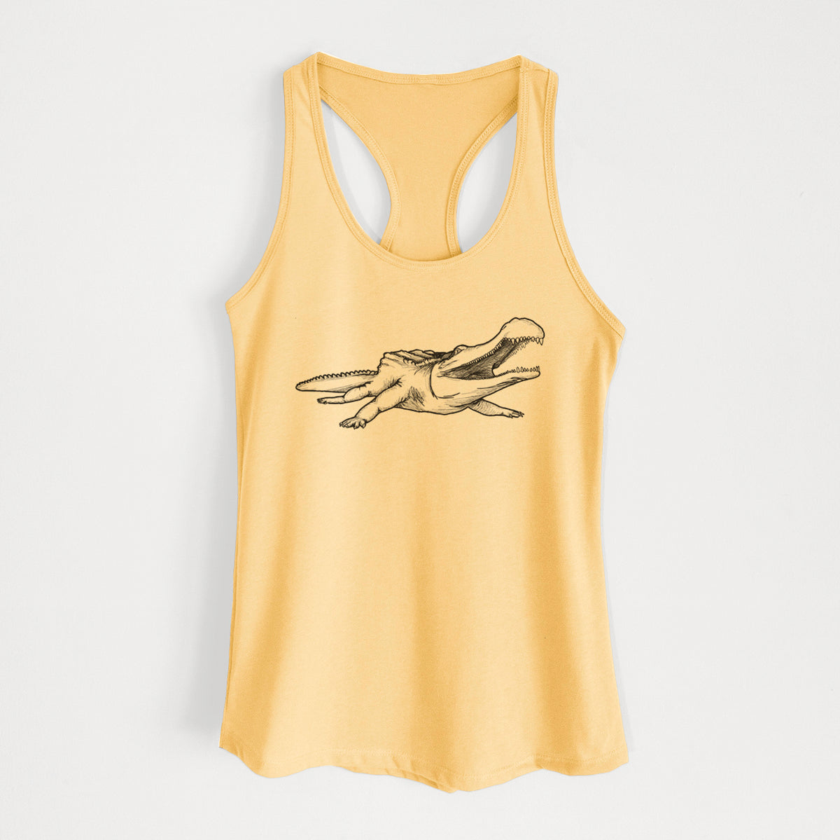 Banana cream women's racerback tank top laid flat, printed with a black ink illustration of a Sarcosuchus, a giant prehistoric crocodile.