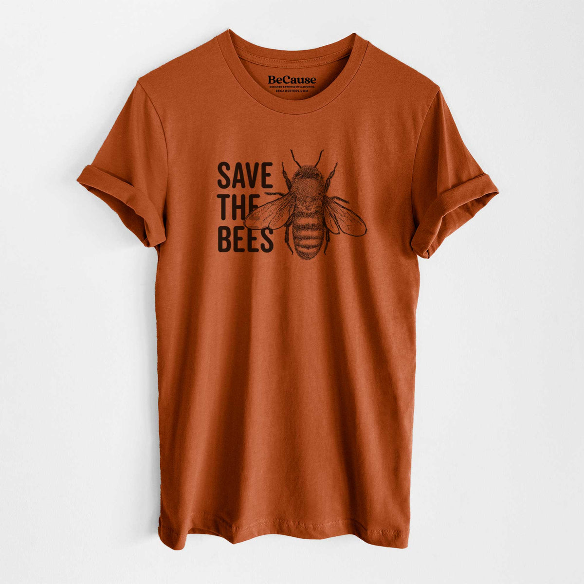 Autumn lightweight cotton t-shirt laid flat, printed with bold black words reading Save the Bees beside a detailed honey bee illustration.