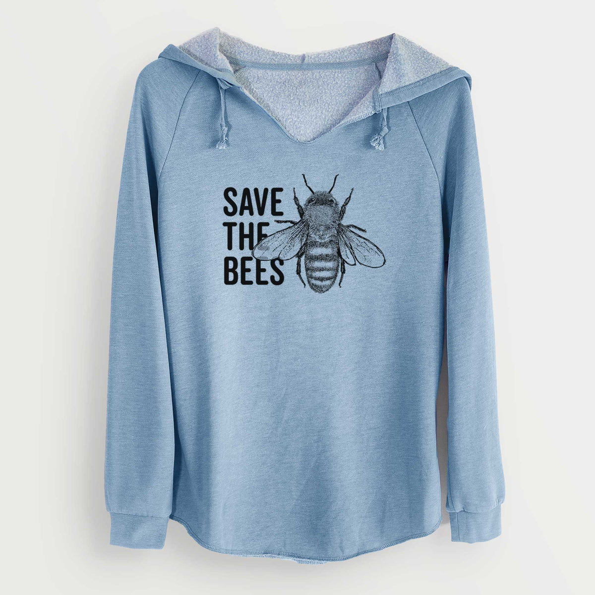 Misty blue women's Cali Wave hooded sweatshirt laid flat, printed with bold black words reading Save the Bees beside a detailed honey bee illustration.