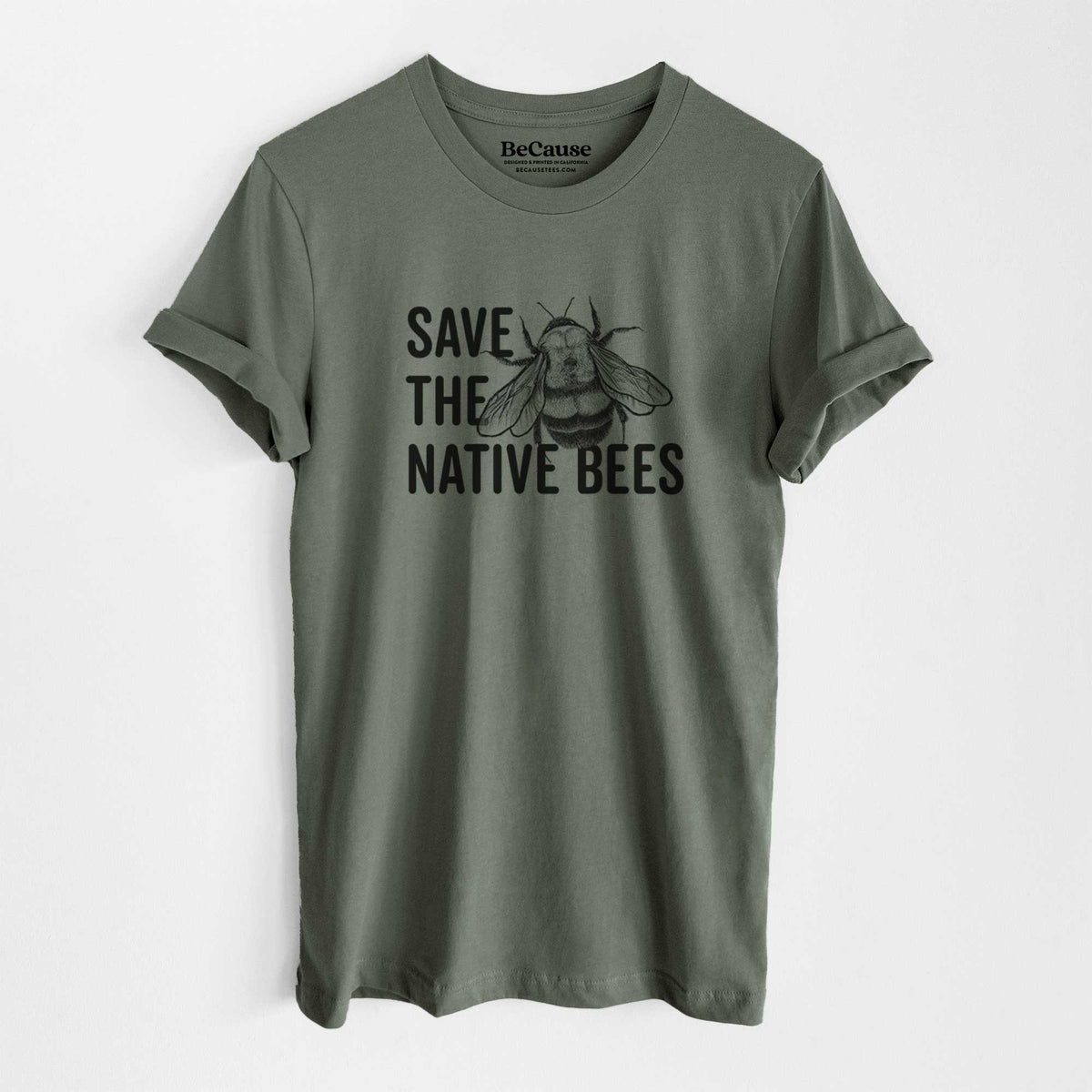 Military green lightweight cotton t-shirt laid flat, printed with bold black words reading Save the Native Bees beside a detailed bee illustration.