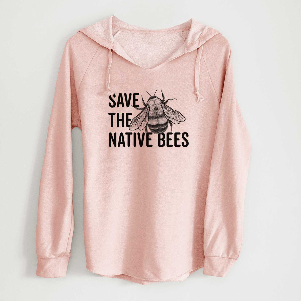 Blush pink women's Cali Wave hooded sweatshirt laid flat, printed with bold black words reading Save the Native Bees beside a detailed bee illustration.
