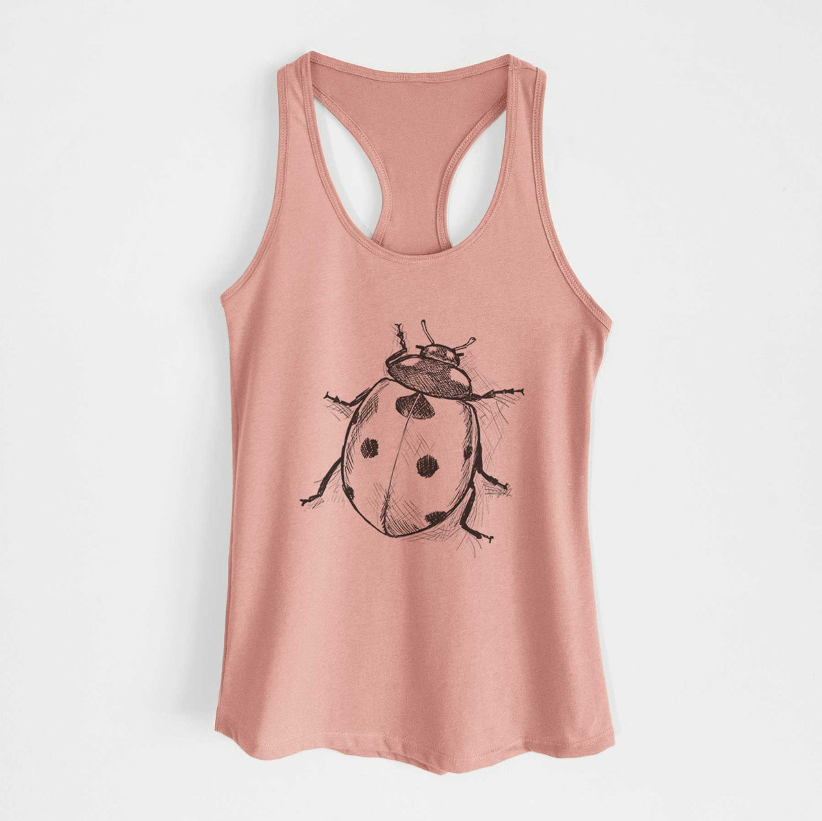 Desert pink women's racerback tank top laid flat, printed with a detailed black ink illustration of a seven-spot ladybird beetle.