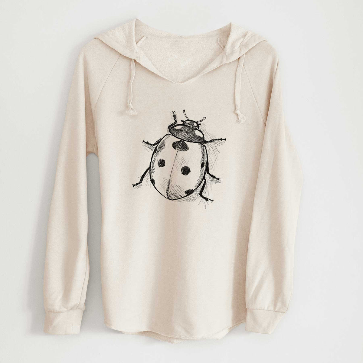Bone cream women's Cali Wave hooded sweatshirt laid flat, printed with a detailed black ink illustration of a seven-spot ladybird beetle.