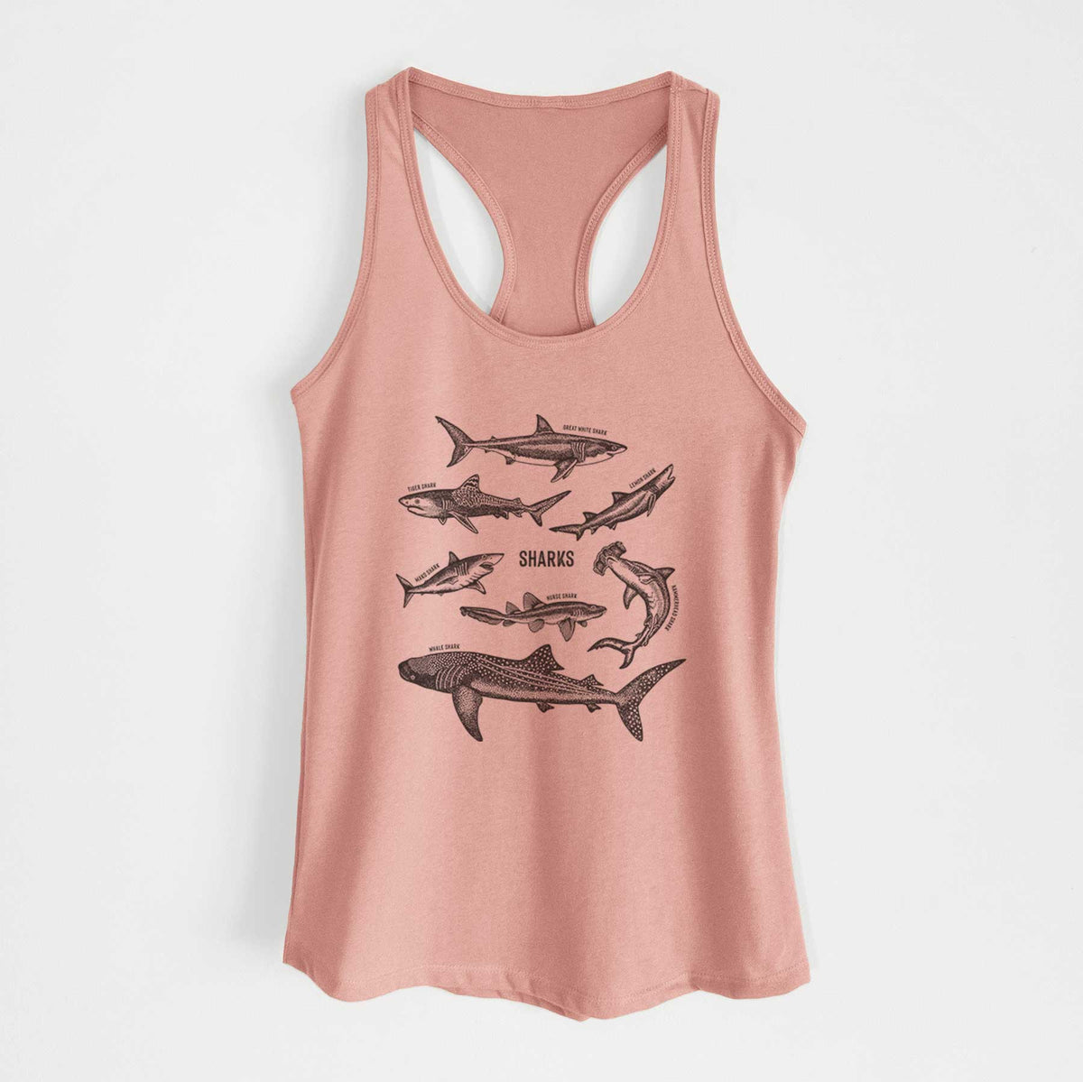 Desert pink women's racerback tank top laid flat, printed with a chart of black ink shark illustrations, including a whale shark, hammerhead and great white.