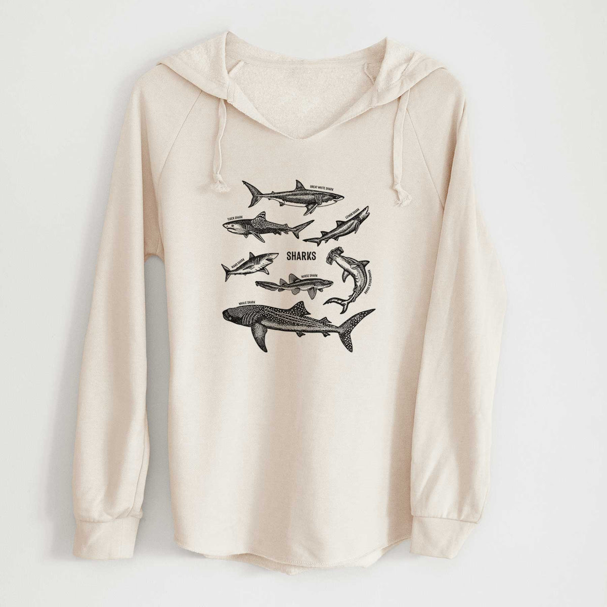 Bone cream women's Cali Wave hooded sweatshirt laid flat, printed with a chart of black ink shark illustrations, including a whale shark, hammerhead and great white.