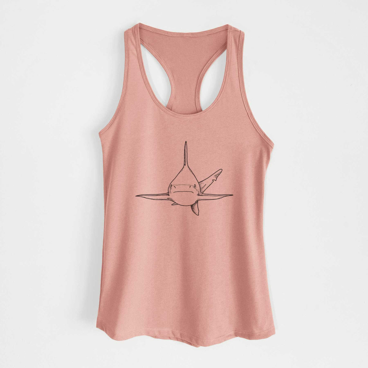Desert pink women's racerback tank top laid flat, printed with a black ink illustration of a silvertip shark swimming head-on.