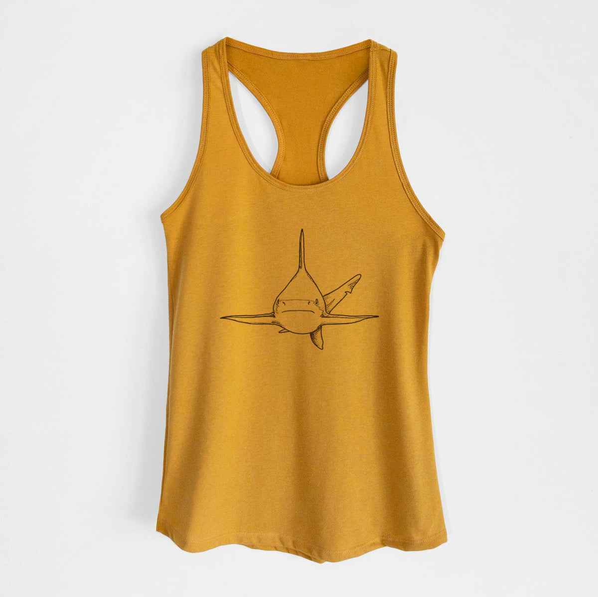 Gold women's racerback tank top laid flat, printed with a black ink illustration of a silvertip shark swimming head-on.