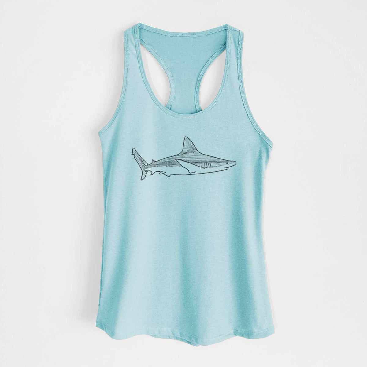 Cancun blue women's racerback tank top laid flat, printed with a black ink illustration of a silvertip shark swimming in profile.