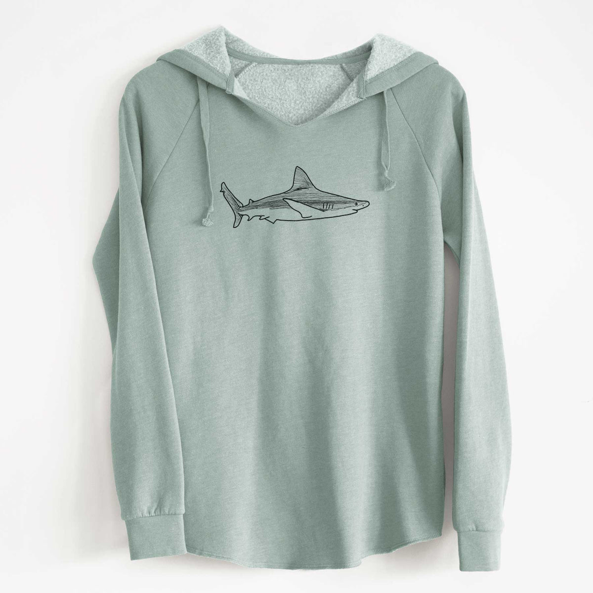 Sage green women's Cali Wave hooded sweatshirt laid flat, printed with a black ink illustration of a silvertip shark swimming in profile.