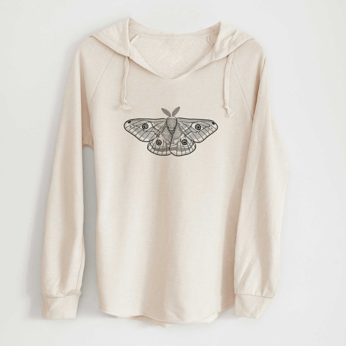 Bone cream women's Cali Wave hooded sweatshirt laid flat, printed with a detailed black ink illustration of a small emperor moth with eyespots on its wings.