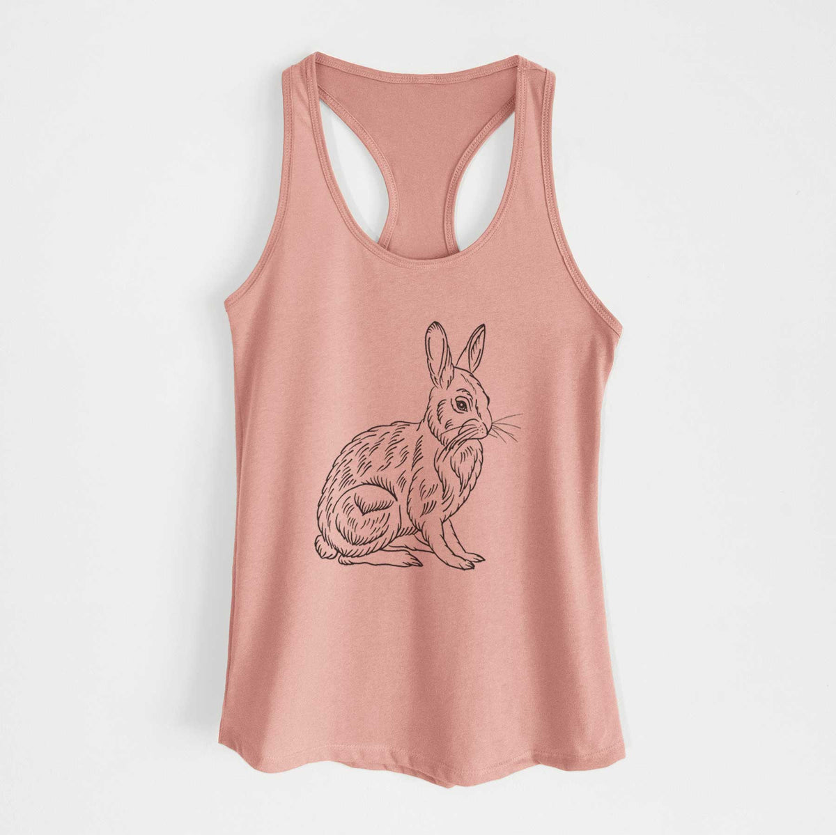 Desert pink women's racerback tank top laid flat, printed with a detailed black ink illustration of a snowshoe hare sitting upright.