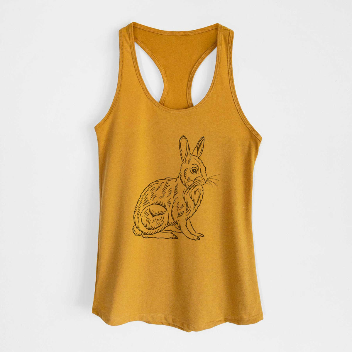 Gold women's racerback tank top laid flat, printed with a detailed black ink illustration of a snowshoe hare sitting upright.