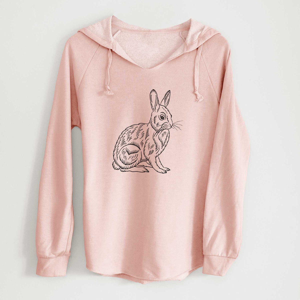 Blush pink women's Cali Wave hooded sweatshirt laid flat, printed with a detailed black ink illustration of a snowshoe hare sitting upright.