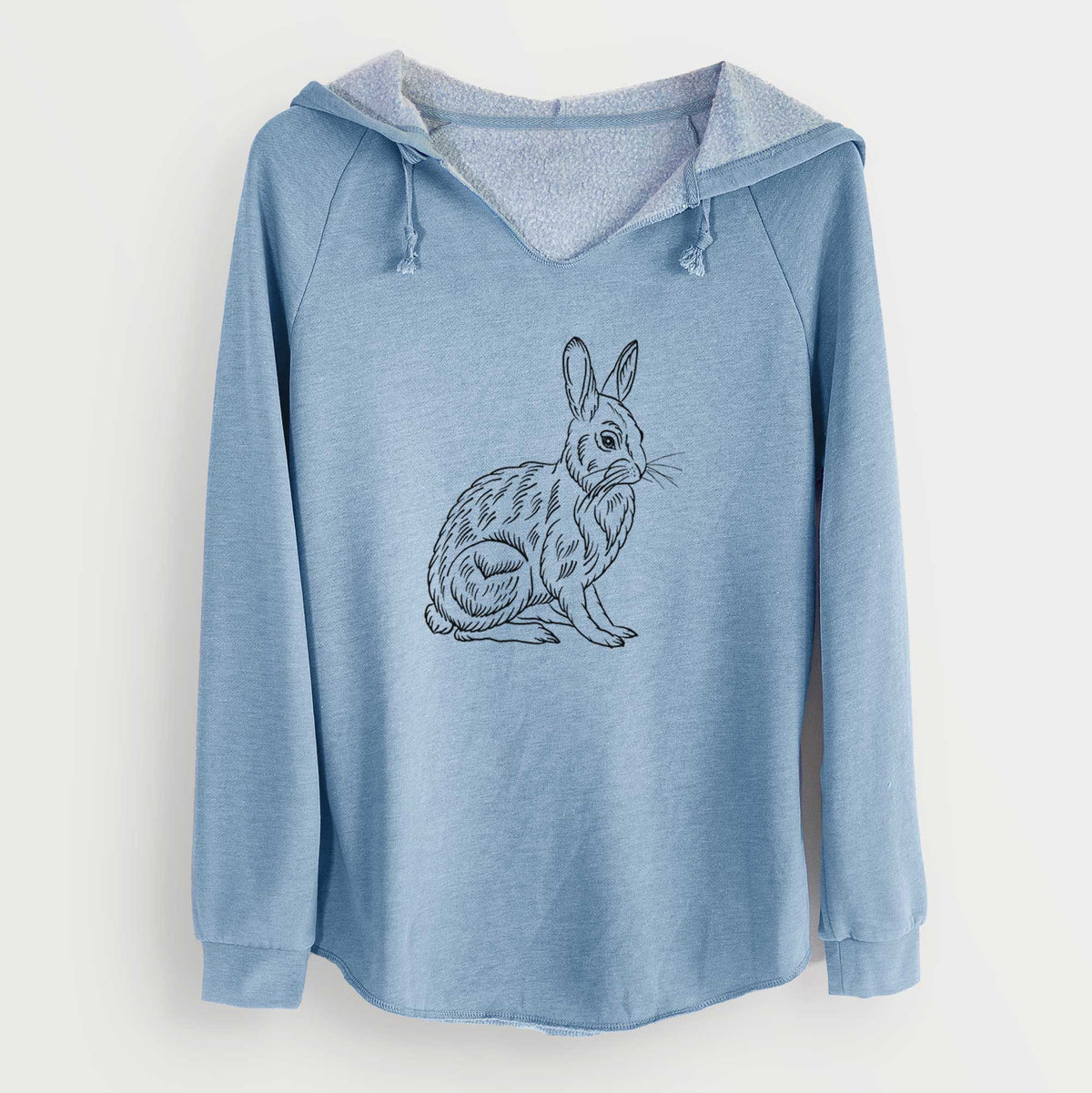 Misty blue women's Cali Wave hooded sweatshirt laid flat, printed with a detailed black ink illustration of a snowshoe hare sitting upright.