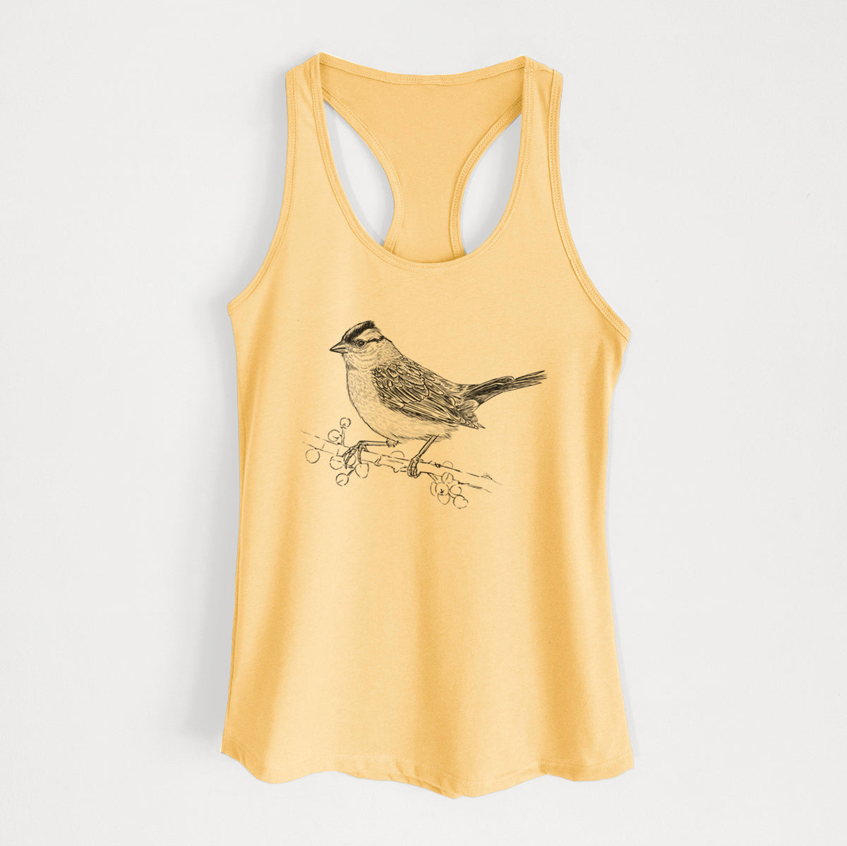 Banana cream women's racerback tank top laid flat, printed with a detailed black ink sketch of a white-crowned sparrow perched on a branch.