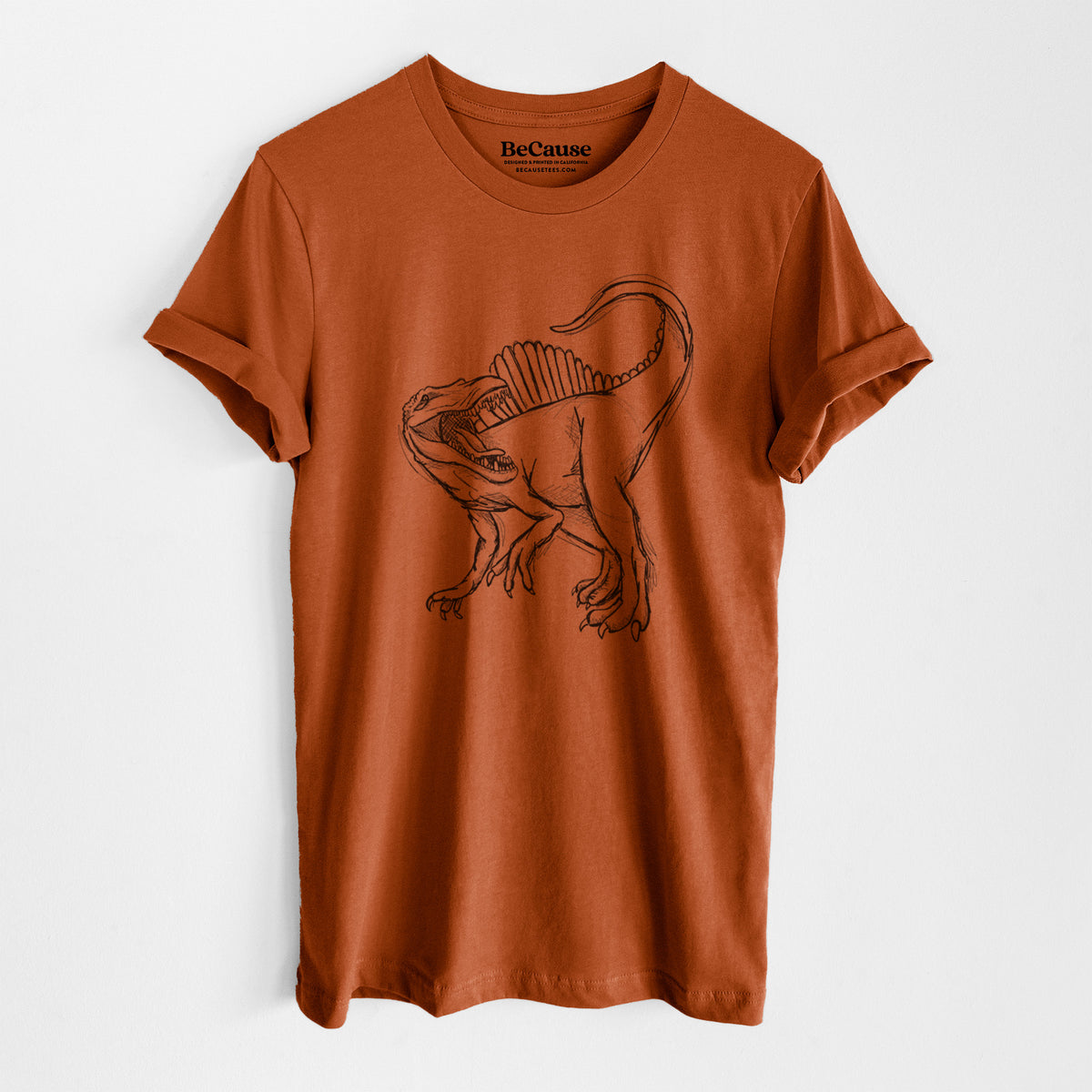 Autumn lightweight cotton t-shirt laid flat, printed with a black ink illustration of a Spinosaurus with its tall sail-shaped back.