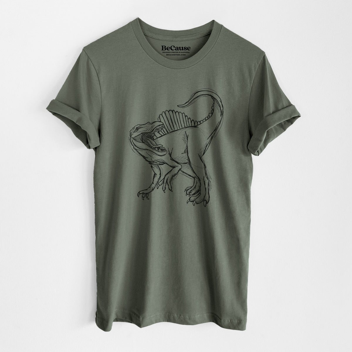 Military green lightweight cotton t-shirt laid flat, printed with a black ink illustration of a Spinosaurus with its tall sail-shaped back.