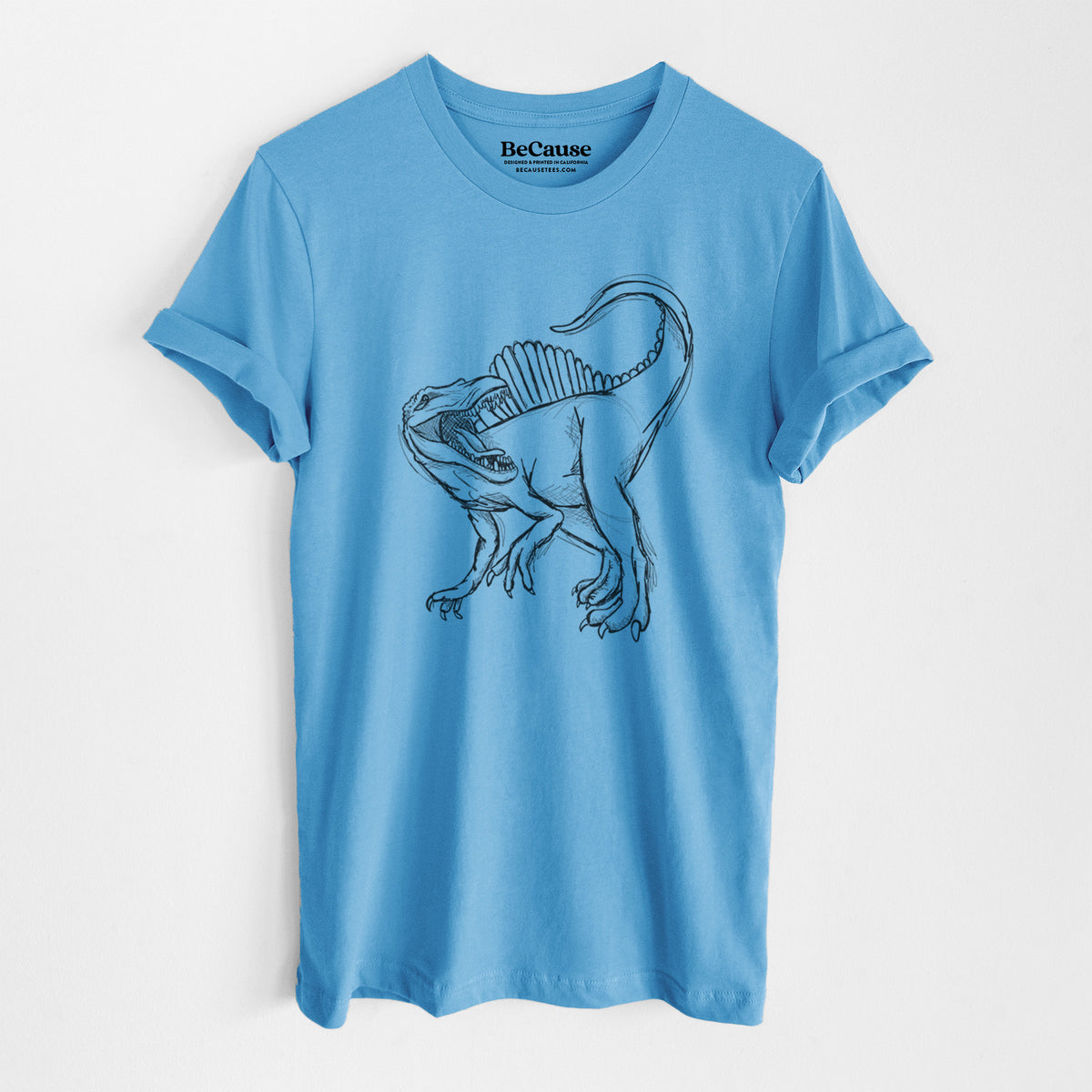 Ocean blue lightweight cotton t-shirt laid flat, printed with a black ink illustration of a Spinosaurus with its tall sail-shaped back.