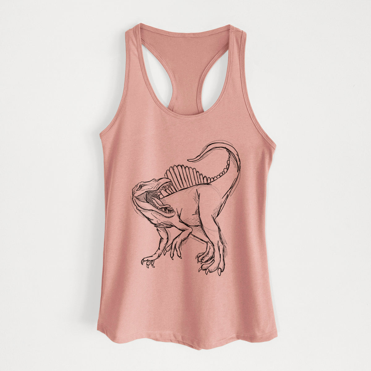 Desert pink women's racerback tank top laid flat, printed with a black ink illustration of a Spinosaurus with its tall sail-shaped back.