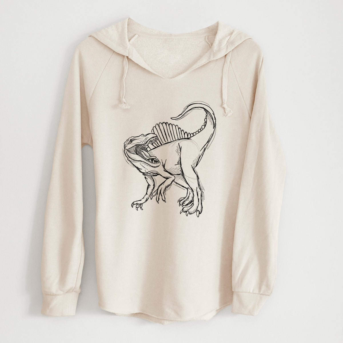 Bone cream women's Cali Wave hooded sweatshirt laid flat, printed with a black ink illustration of a Spinosaurus with its tall sail-shaped back.