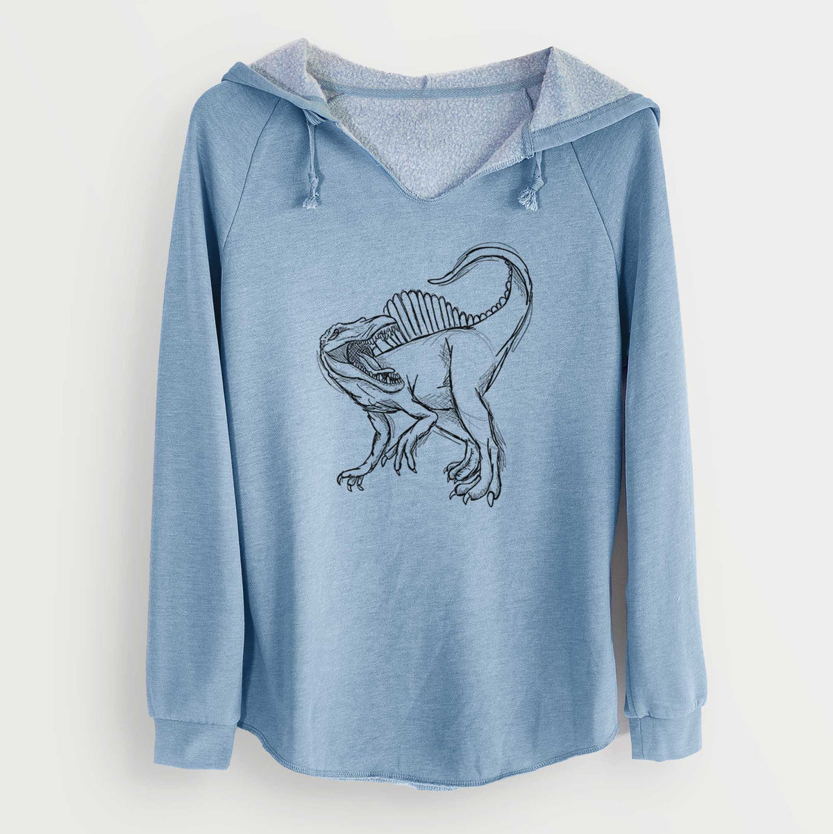 Misty blue women's Cali Wave hooded sweatshirt laid flat, printed with a black ink illustration of a Spinosaurus with its tall sail-shaped back.
