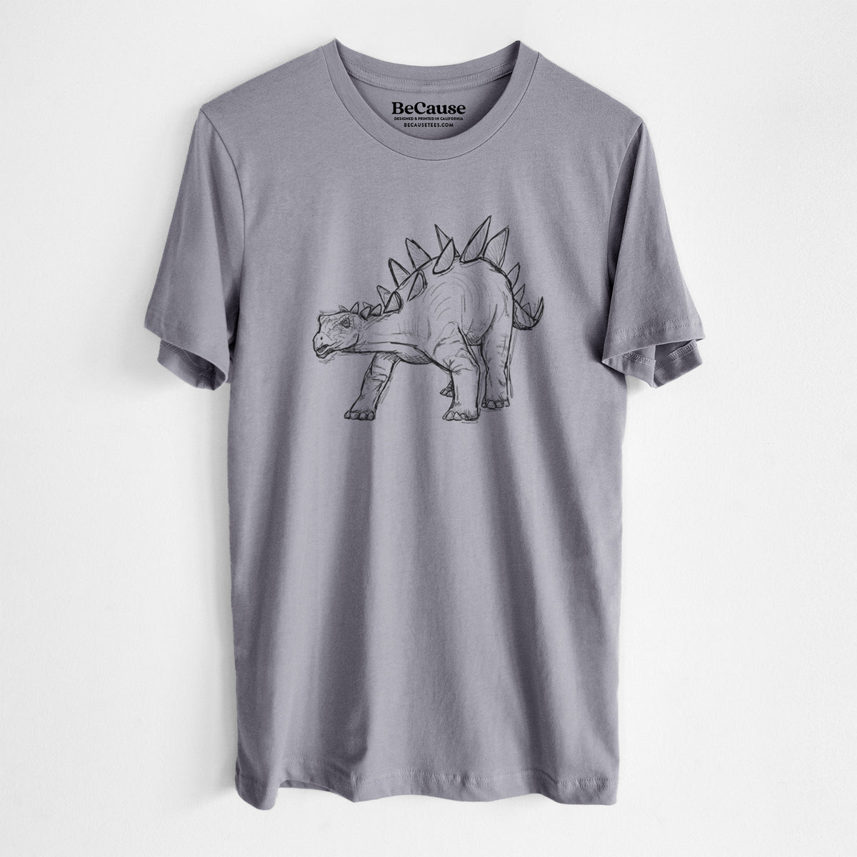 Storm grey lightweight cotton t-shirt laid flat, printed with a black ink illustration of a Stegosaurus with plates along its back.