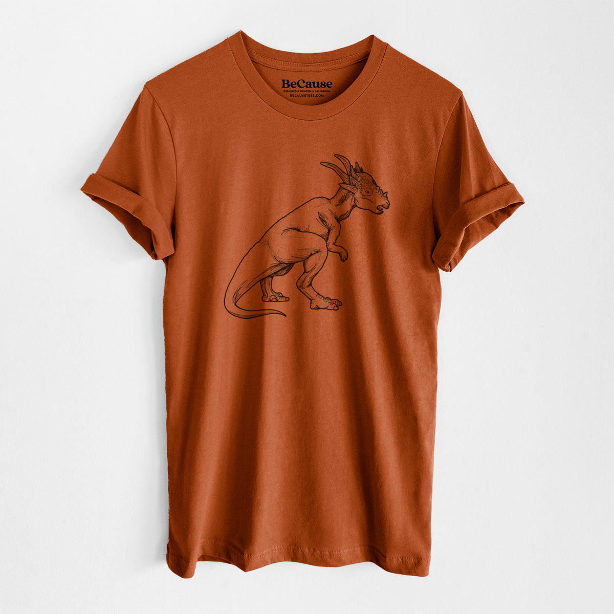 Autumn lightweight cotton t-shirt laid flat, printed with a black ink illustration of a Stygimoloch dinosaur with a spiky domed head.