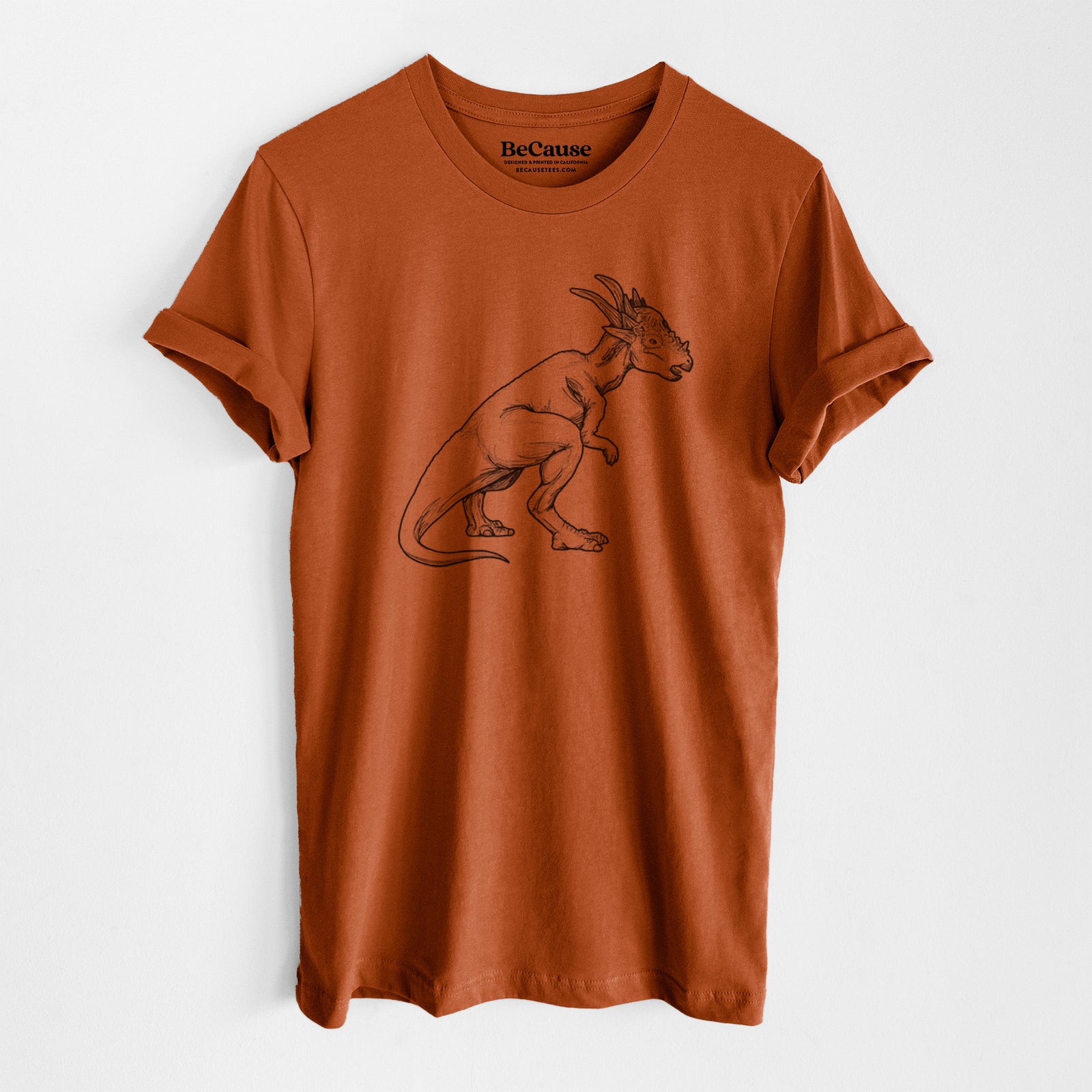 Autumn lightweight cotton t-shirt laid flat, printed with a black ink illustration of a Stygimoloch dinosaur with a spiky domed head.