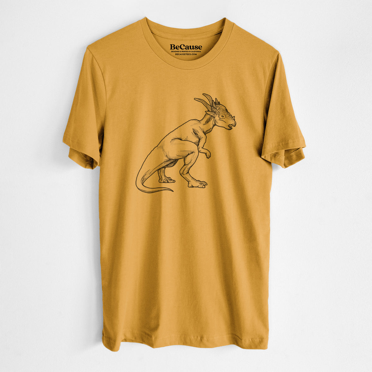 Mustard yellow lightweight cotton t-shirt laid flat, printed with a black ink illustration of a Stygimoloch dinosaur with a spiky domed head.
