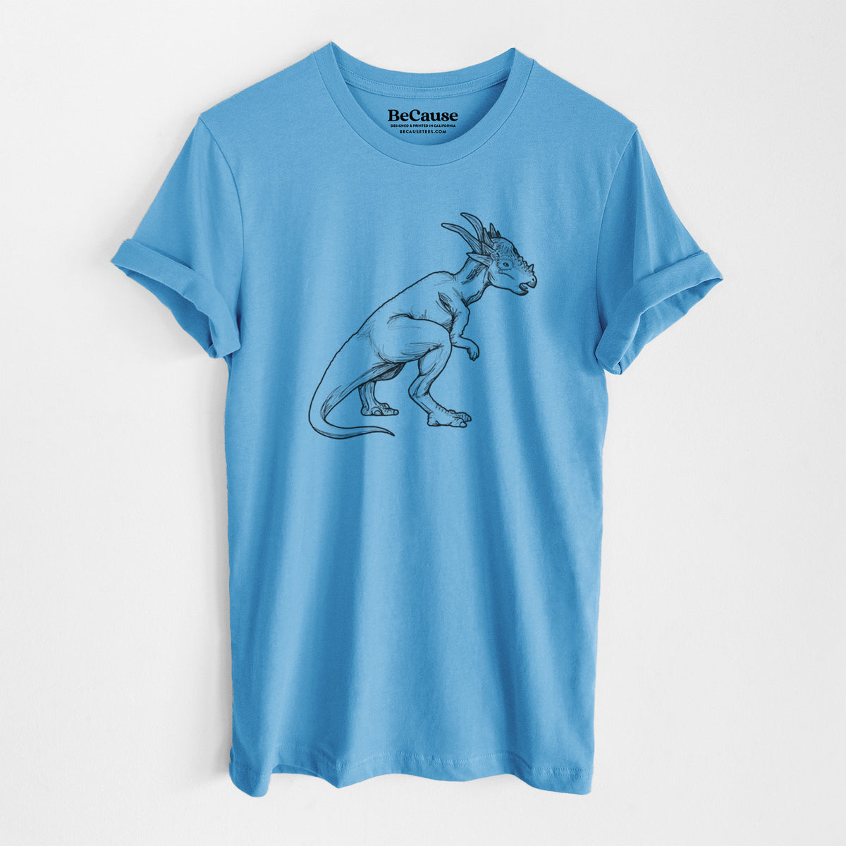 Ocean blue lightweight cotton t-shirt laid flat, printed with a black ink illustration of a Stygimoloch dinosaur with a spiky domed head.