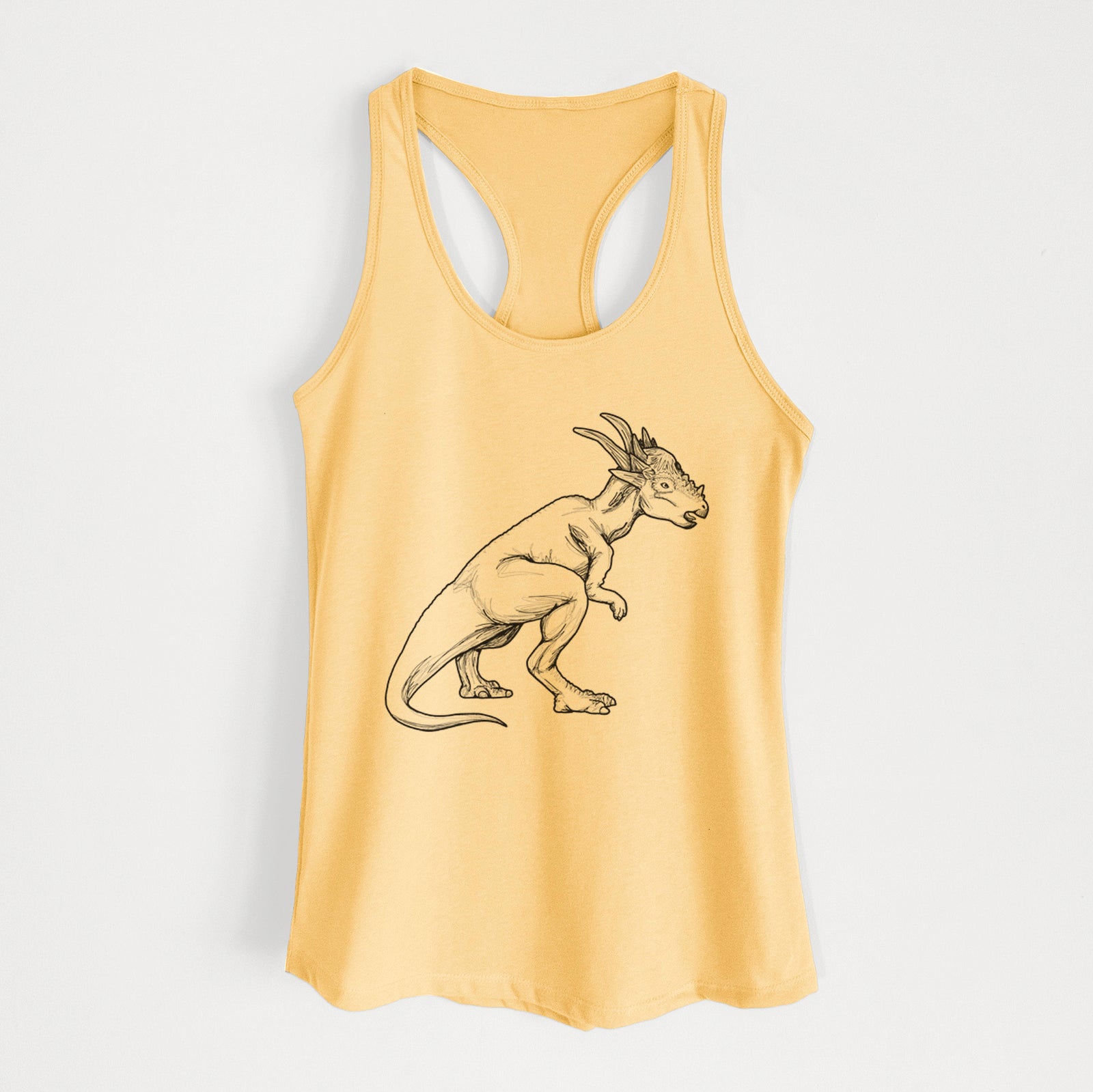 Banana cream women's racerback tank top laid flat, printed with a black ink illustration of a Stygimoloch dinosaur with a spiky domed head.