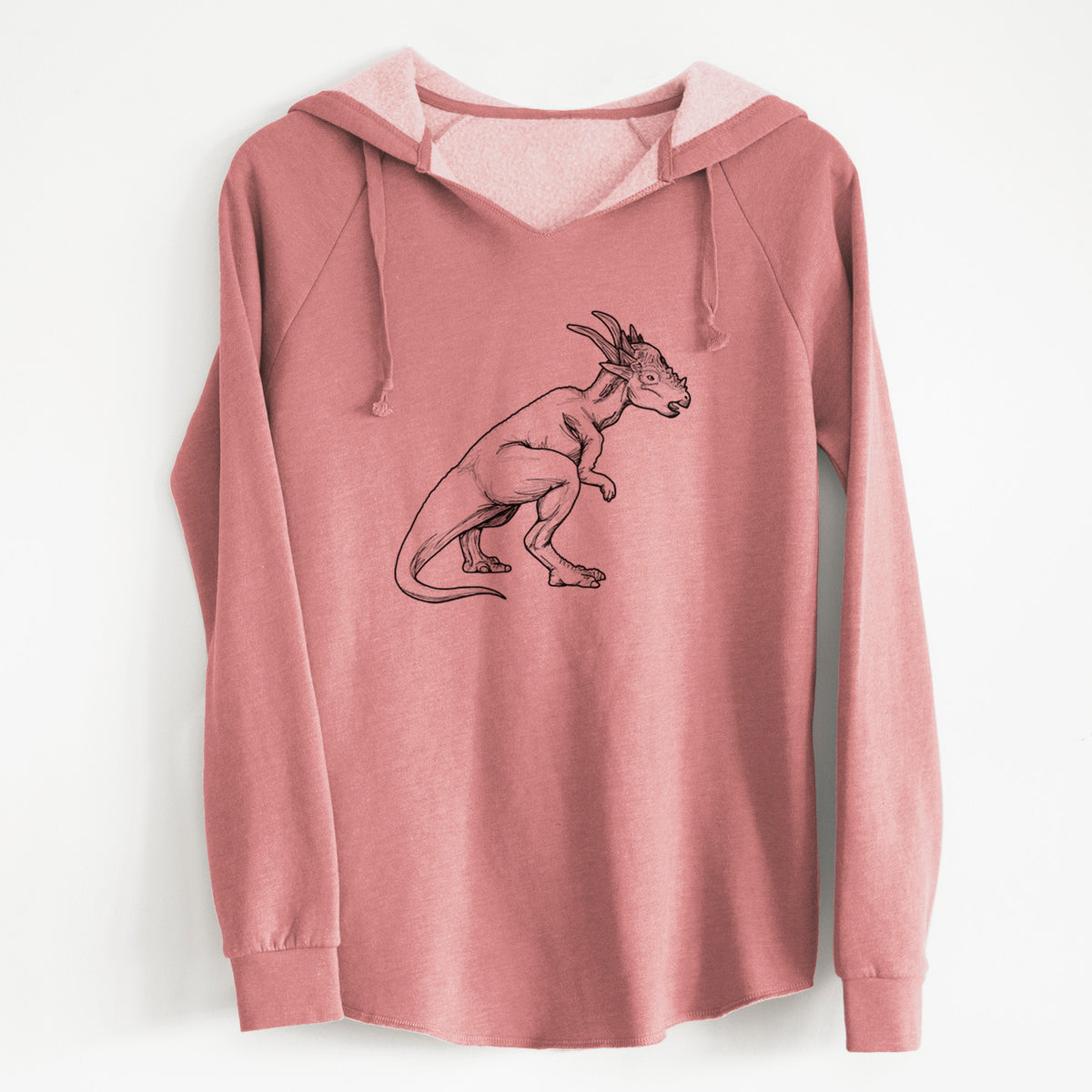 Dusty rose women's Cali Wave hooded sweatshirt laid flat, printed with a black ink illustration of a Stygimoloch dinosaur with a spiky domed head.