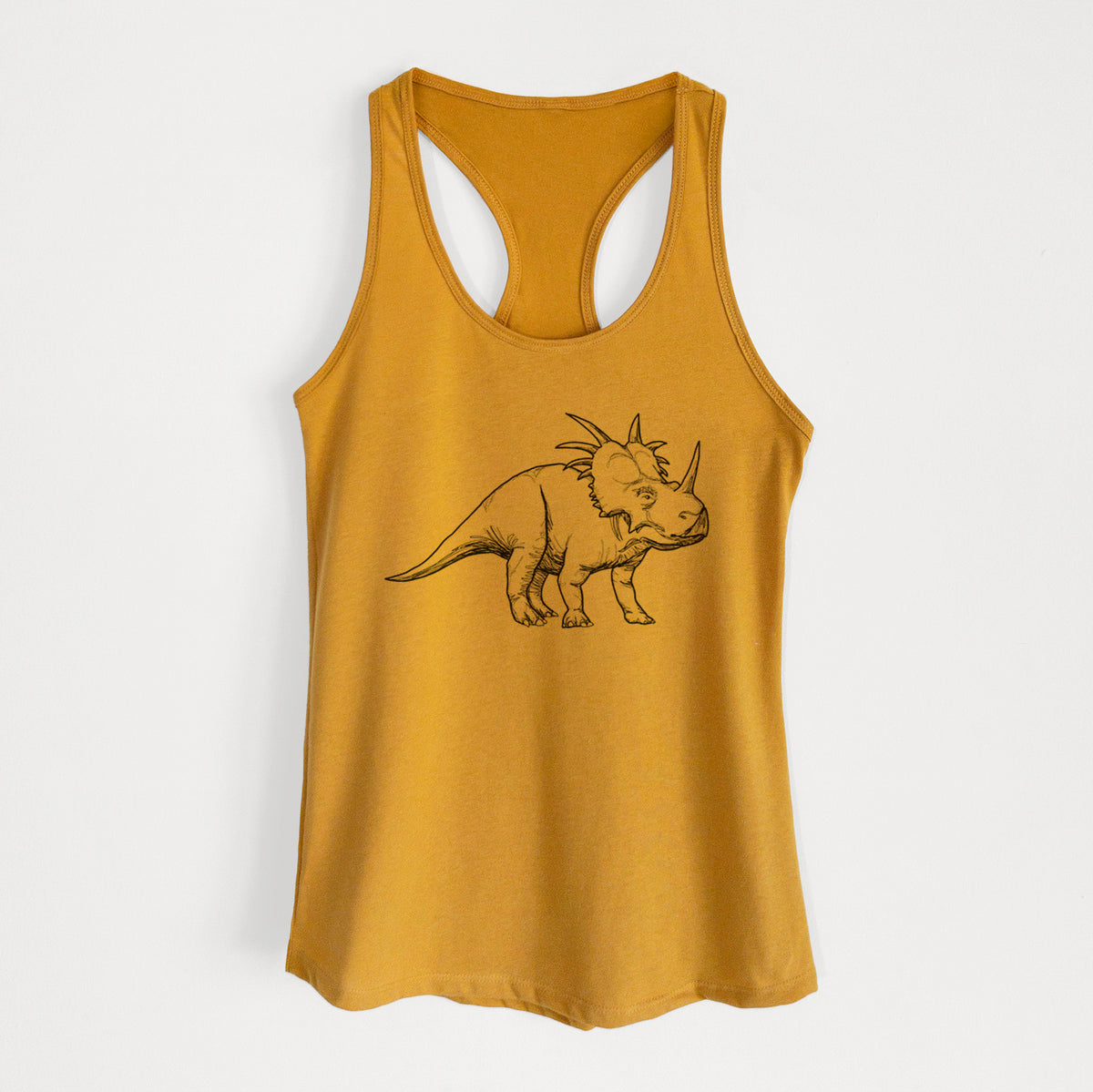 Gold women's racerback tank top laid flat, printed with a black ink illustration of a Styracosaurus with its spiked frill.