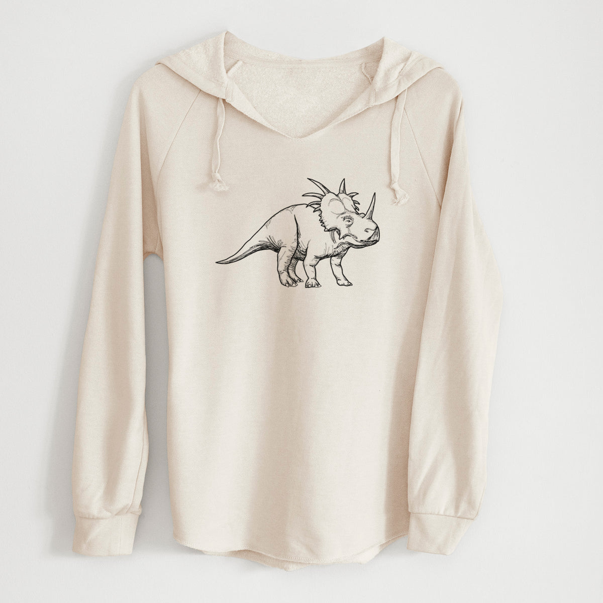 Bone cream women's Cali Wave hooded sweatshirt laid flat, printed with a black ink illustration of a Styracosaurus with its spiked frill.