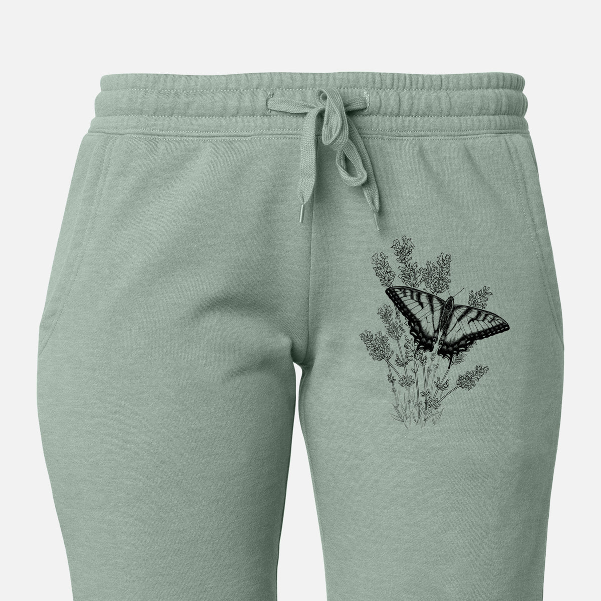 Front of sage green Cali Wave sweatpants, printed with a black ink illustration of a swallowtail butterfly resting on lavender on the leg.