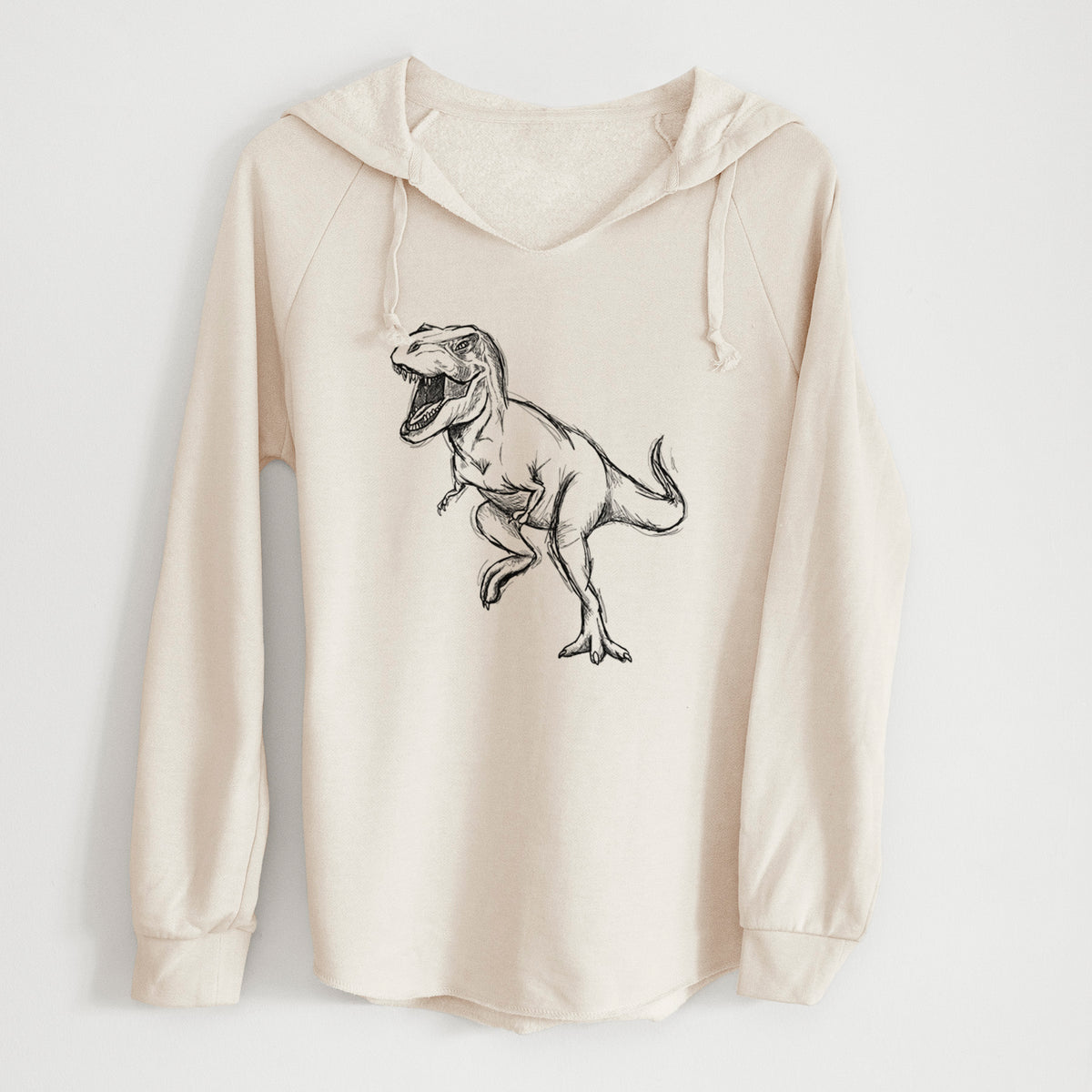 Bone cream women's Cali Wave hooded sweatshirt laid flat, printed with a black ink illustration of a Tyrannosaurus rex roaring.