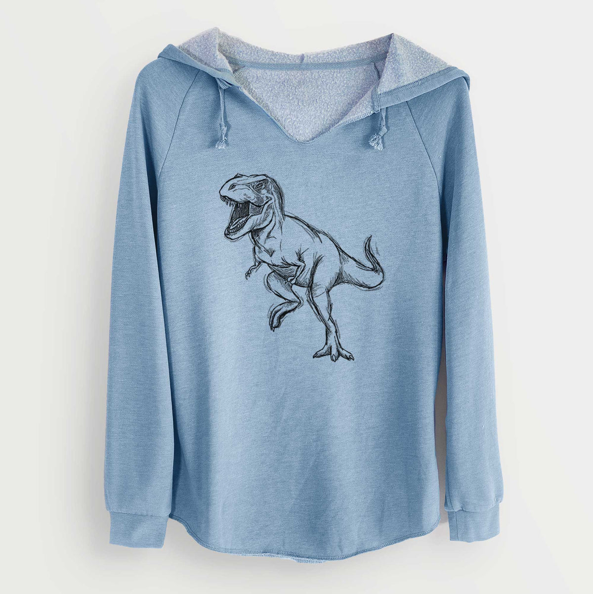 Misty blue women's Cali Wave hooded sweatshirt laid flat, printed with a black ink illustration of a Tyrannosaurus rex roaring.