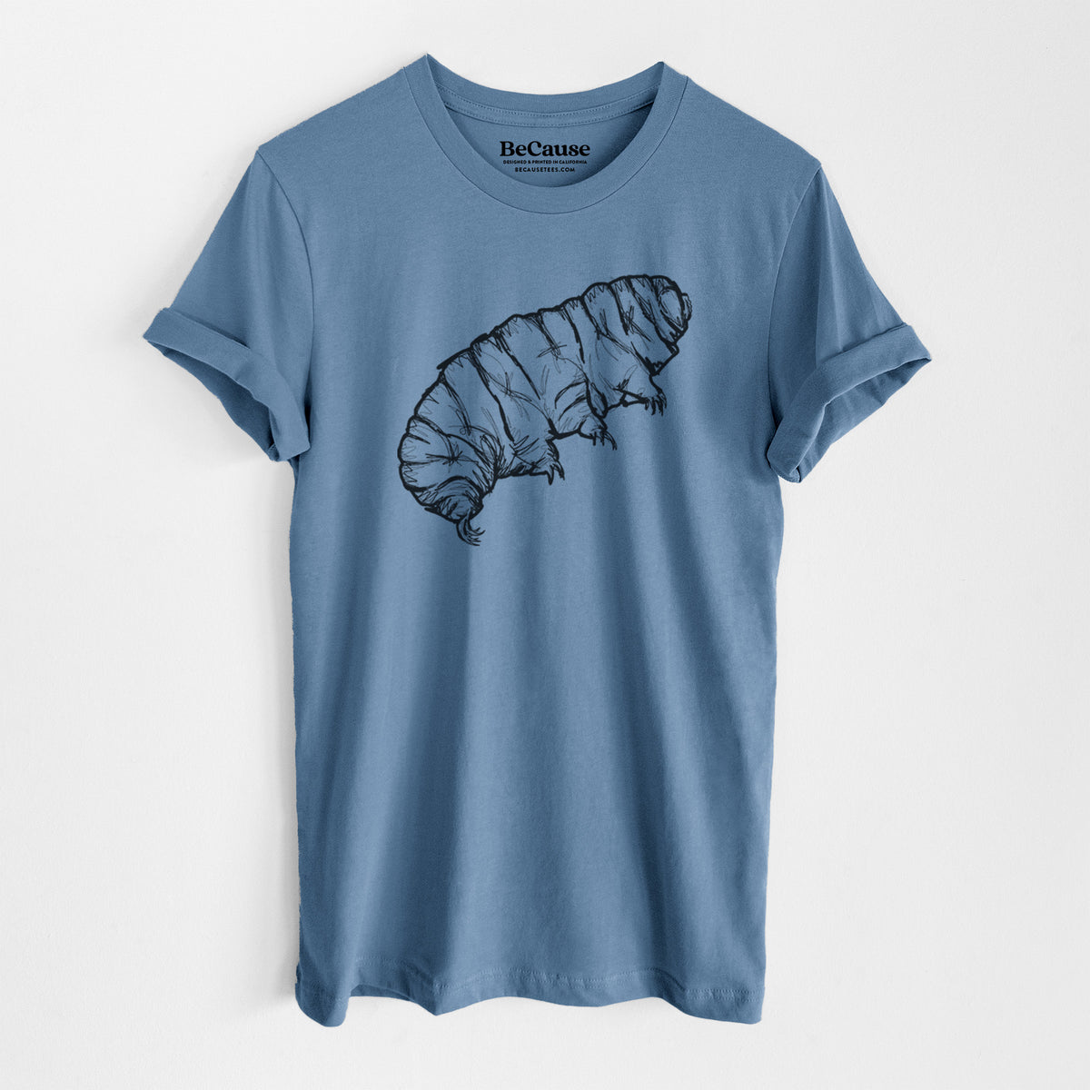 Steel blue lightweight cotton t-shirt laid flat, printed with a detailed black ink illustration of a tardigrade, or water bear.