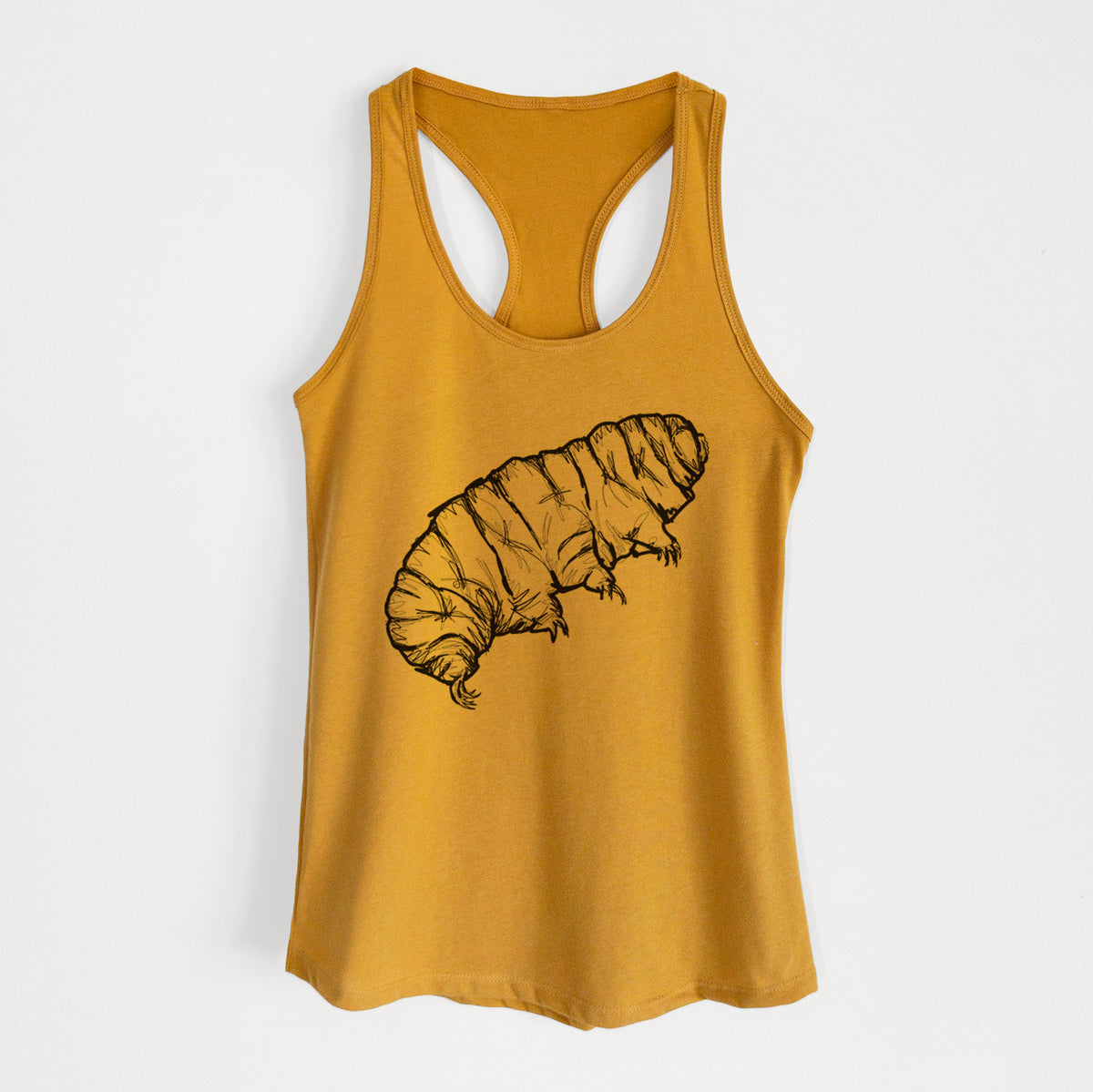 Gold women's racerback tank top laid flat, printed with a detailed black ink illustration of a tardigrade, or water bear.