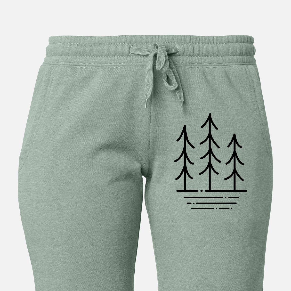 Front of sage green Cali Wave sweatpants, printed with black line art of three simple pine trees above horizontal lines on the leg.