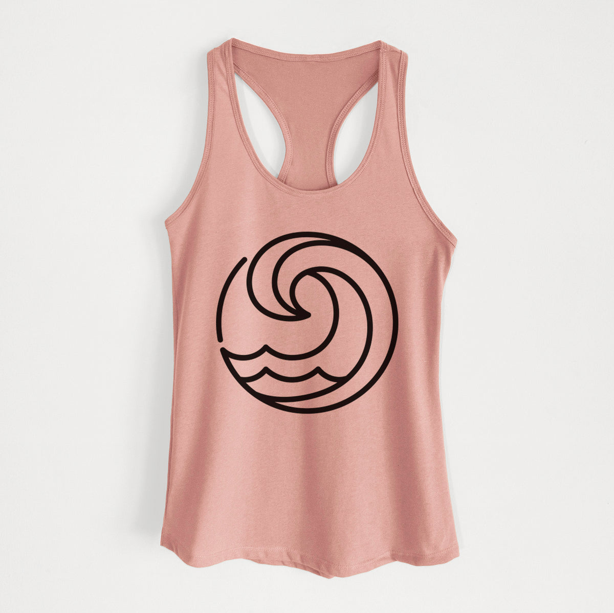 Desert pink women's racerback tank top laid flat, printed with a bold black line art circle of a curling ocean wave.