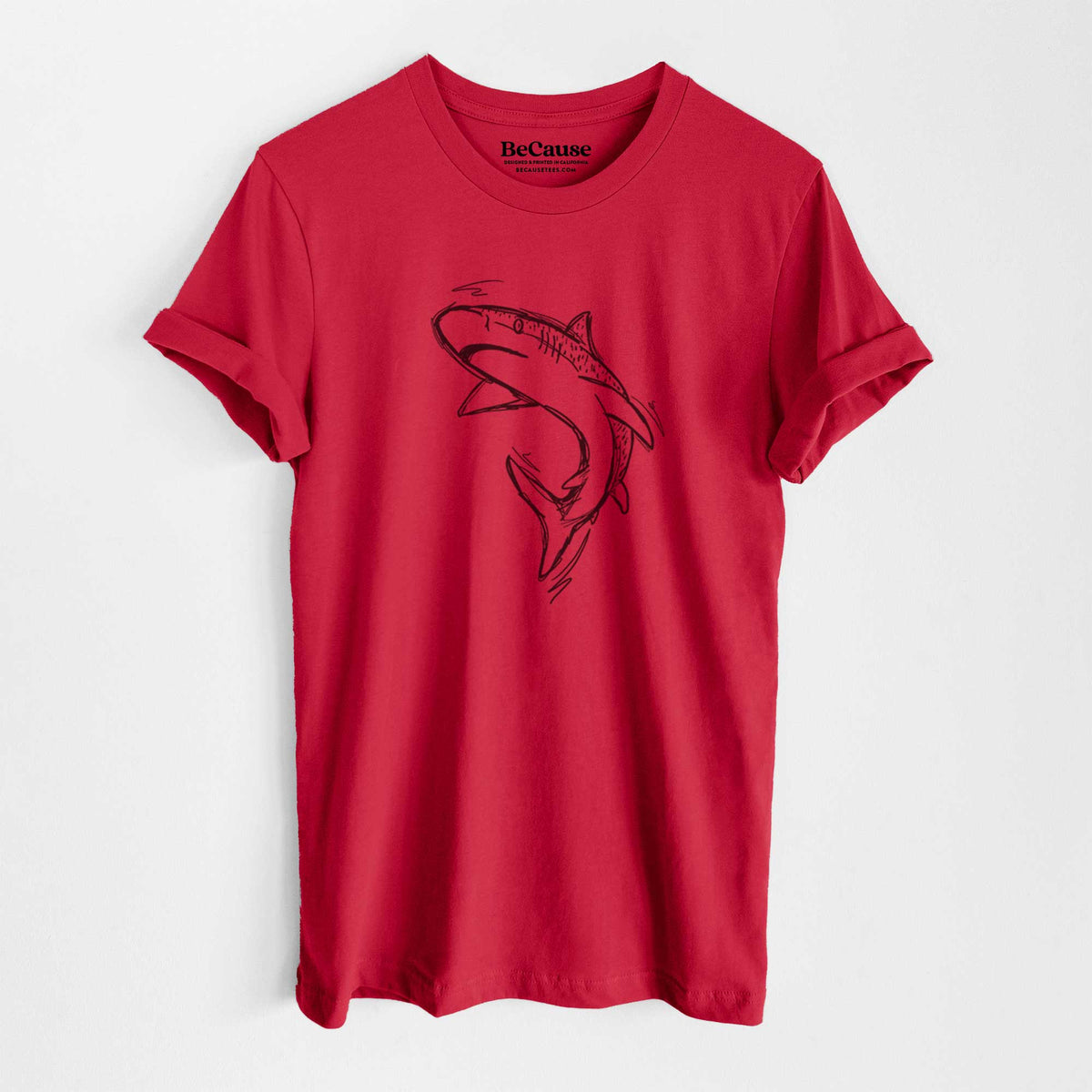 Ruby red lightweight cotton t-shirt laid flat, printed with a black ink illustration of a tiger shark swimming in a curve.