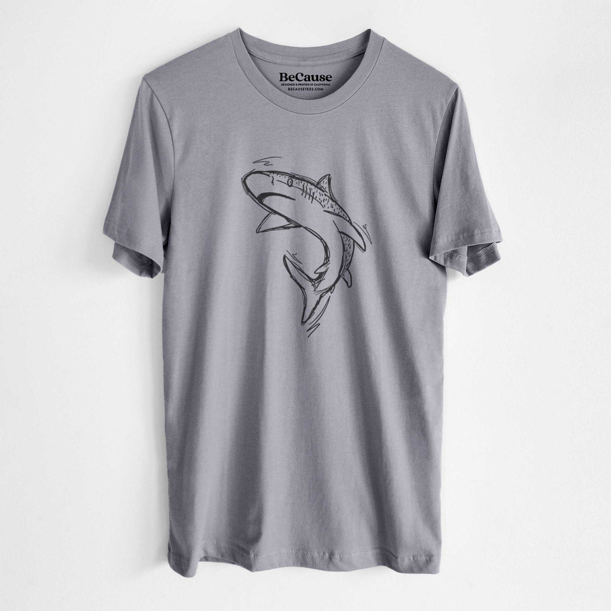 Storm grey lightweight cotton t-shirt laid flat, printed with a black ink illustration of a tiger shark swimming in a curve.
