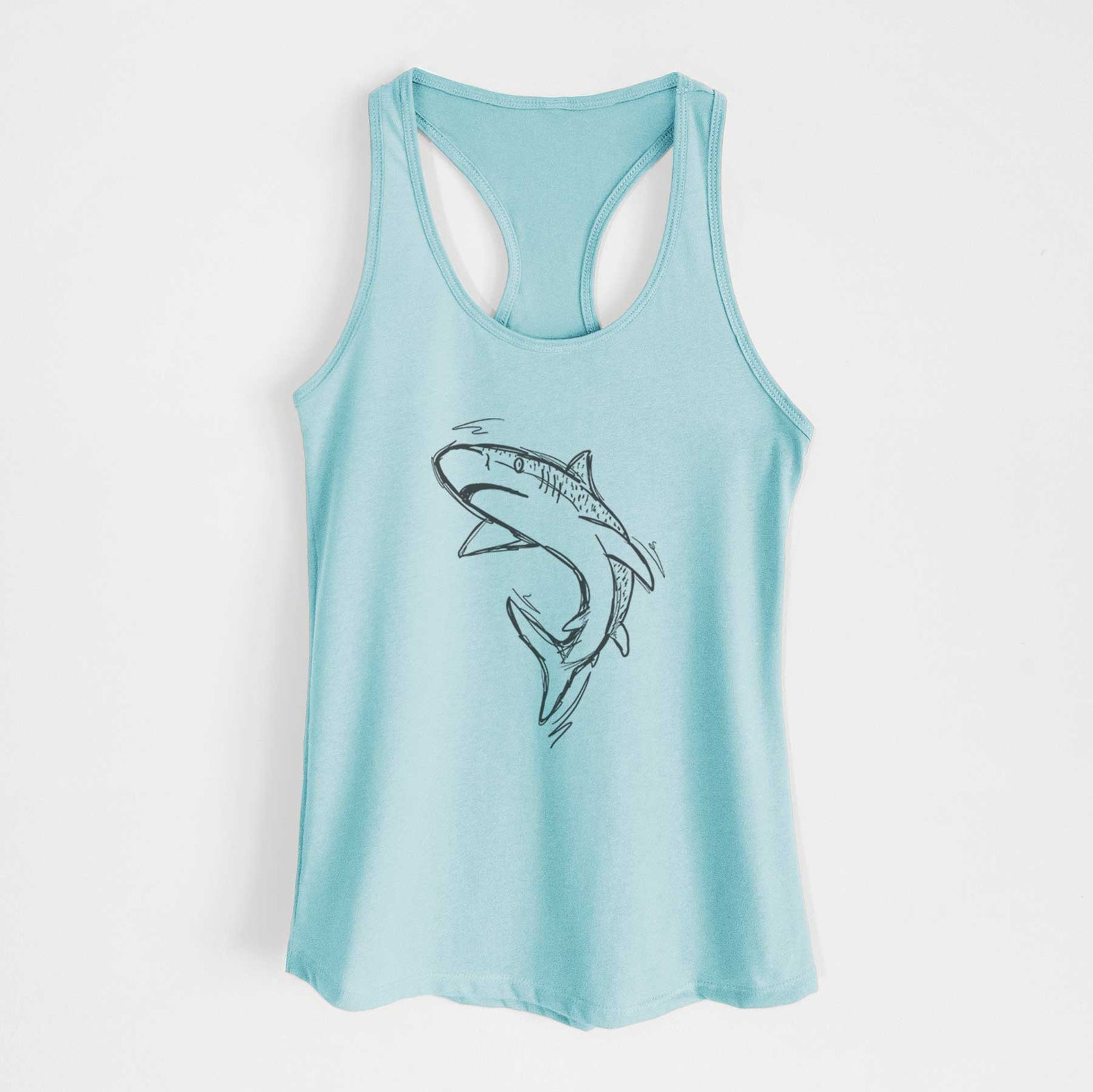 Banana cream women's racerback tank top laid flat, printed with a black ink illustration of a tiger shark swimming in a curve.